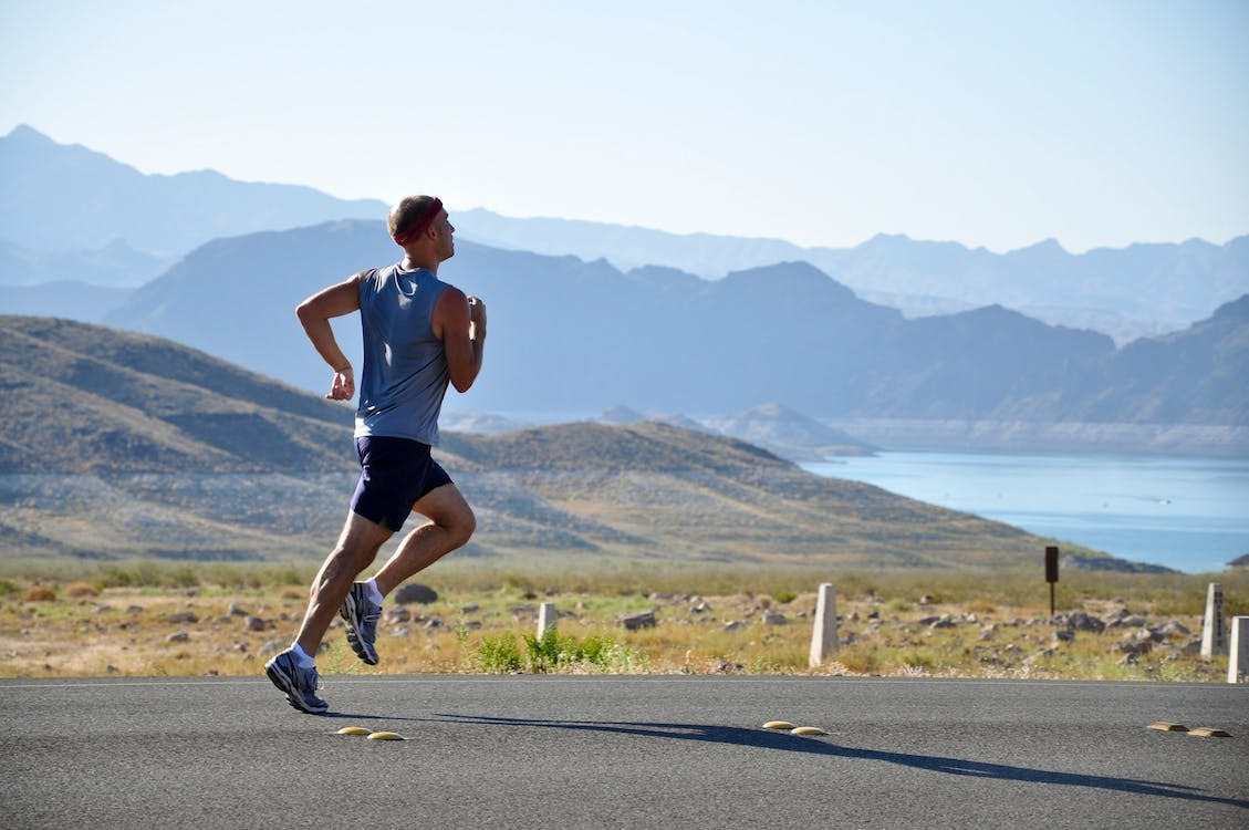 image of athlete jogging in countryside