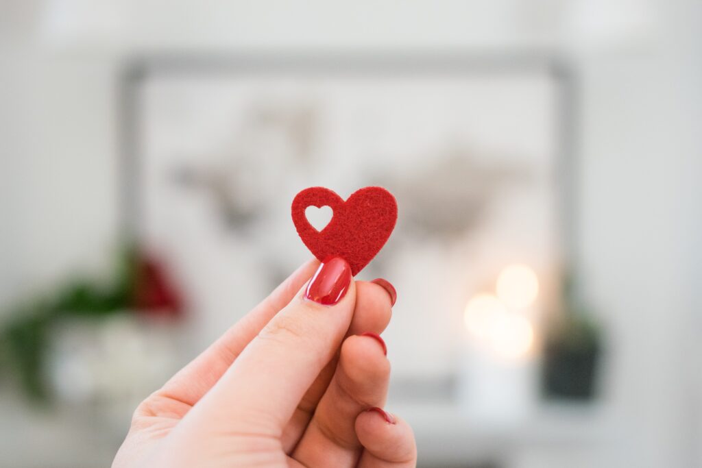 image of person holding a craft heart